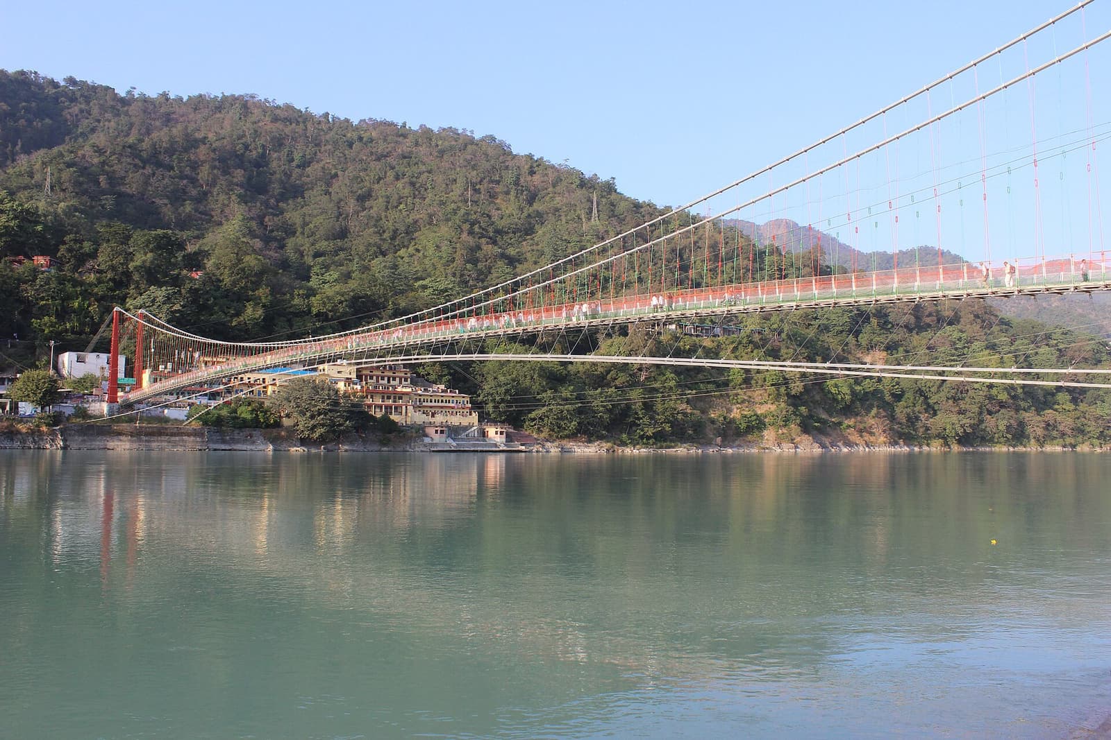 A riverside terrace near Rishikesh set for an evening aarti.